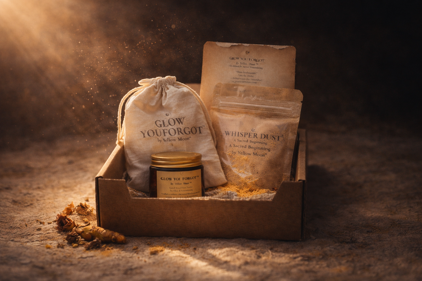 Box with 'Glow You Forgot' and 'Whisper Dust' products on a textured surface with warm lighting.
