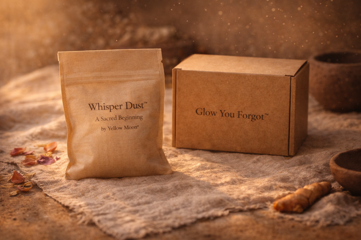 Two brown cardboard boxes labeled 'Whisper Dust' and 'Glow You Forgot' on a textured surface.